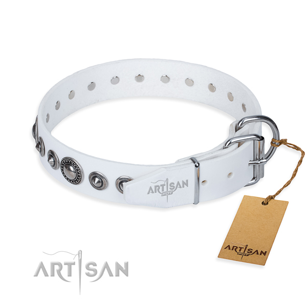 Leather dog collar made of soft to touch material with rust resistant adornments